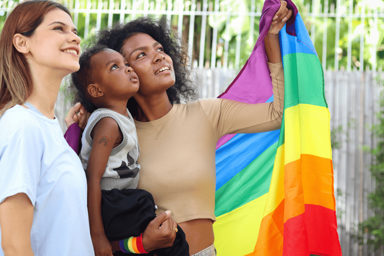 This image reflects the love and bond shared by LGBTQ+ non-biological parents and their children.